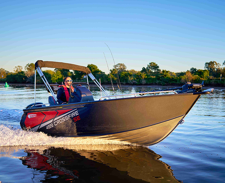 Revolutionary Hull grey colored boat in a peaceful water